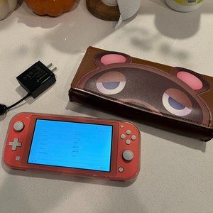 Nintendo Switch Lite in Coral Pink Console System with Animal Crossing Case